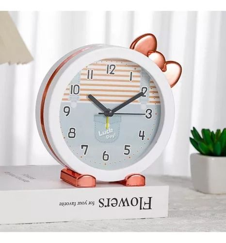 Đồng hồ báo thức để bàn mặt tròn Hello Kitty dễ thương kích thước 14.2*5.4*14.8 cm