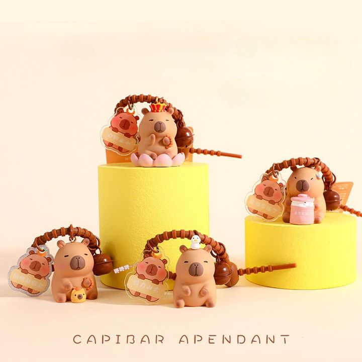 Móc khóa Silicon hình Capybara gõ mõ